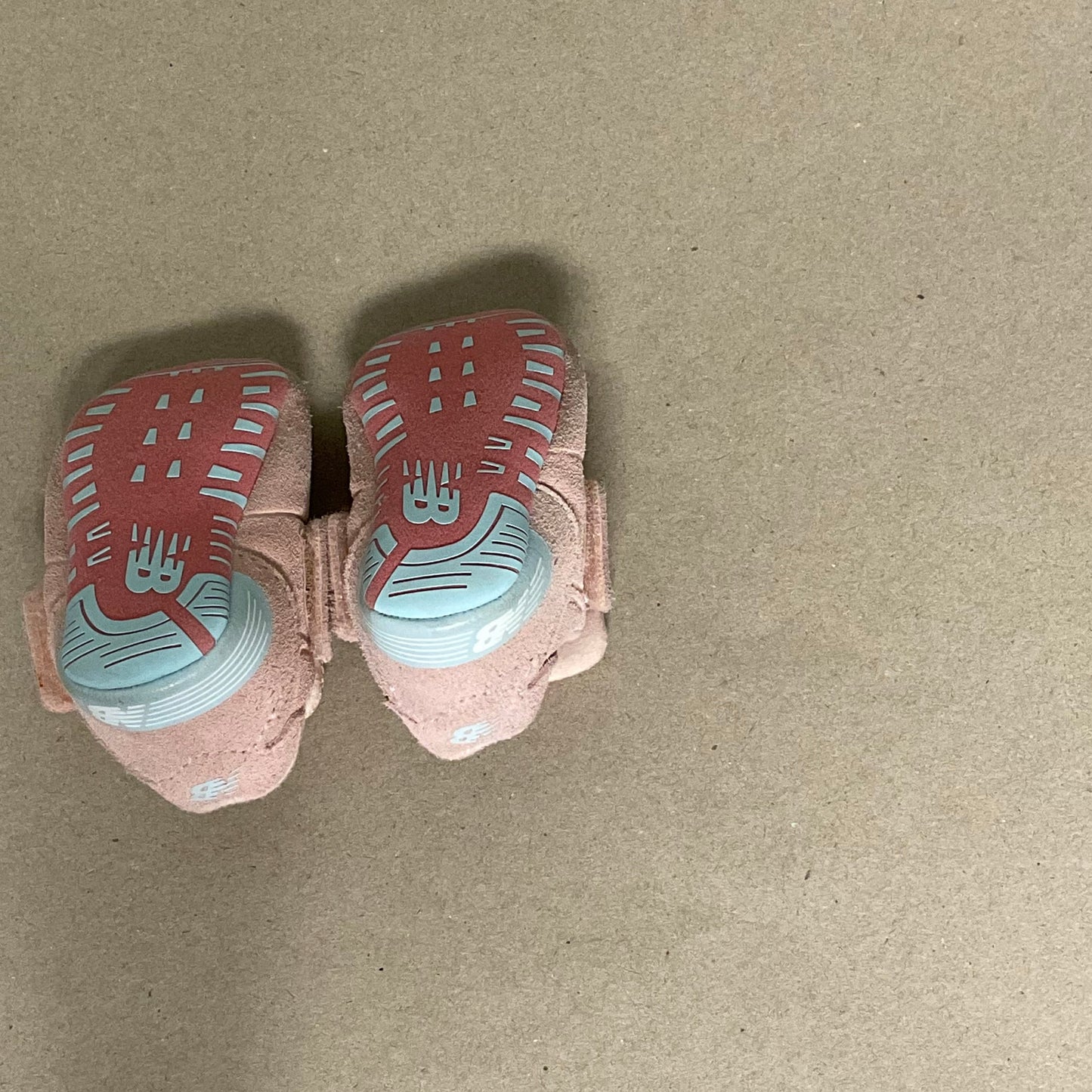 Pink floral New Balance crib shoes