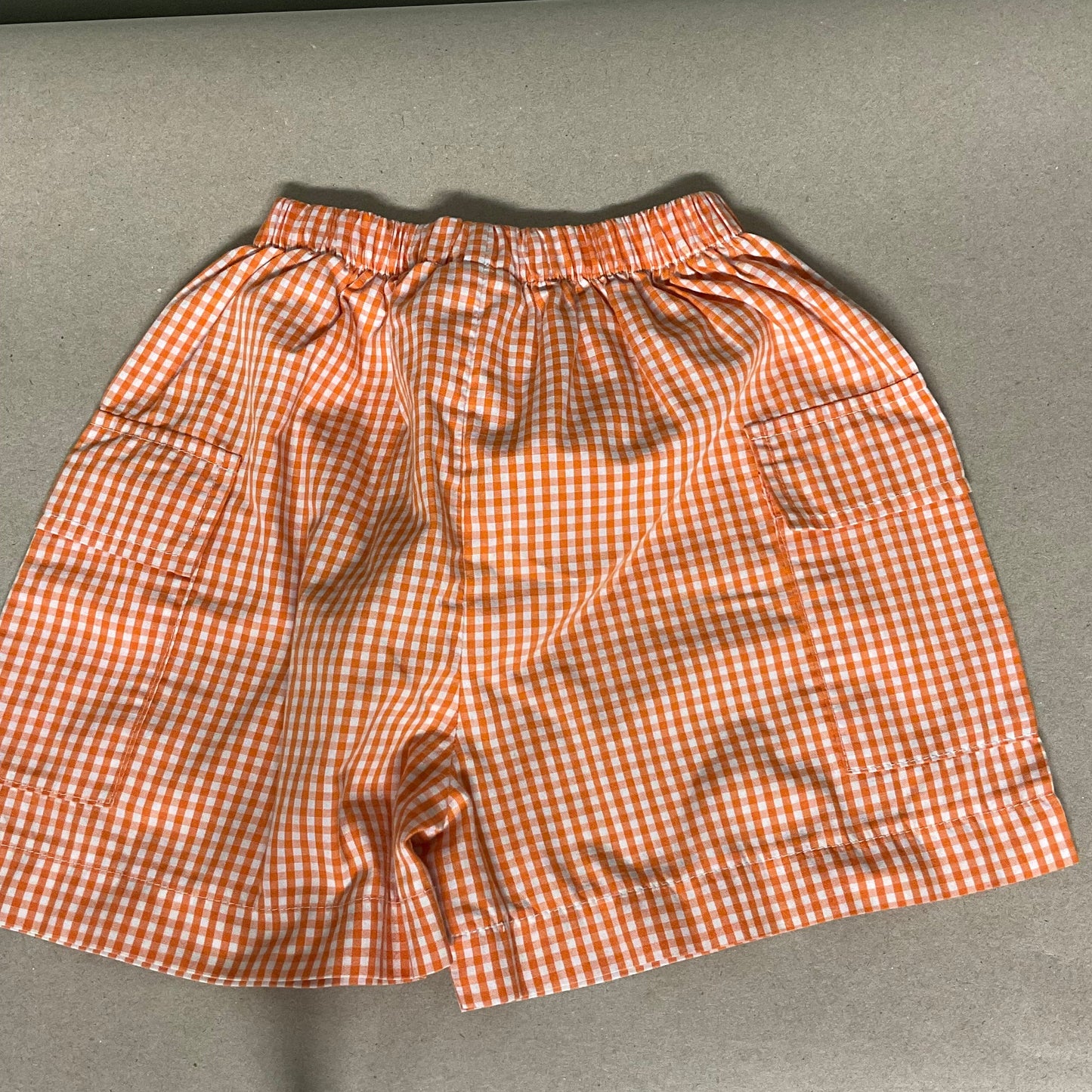 Orange/white gingham cargo shorts
