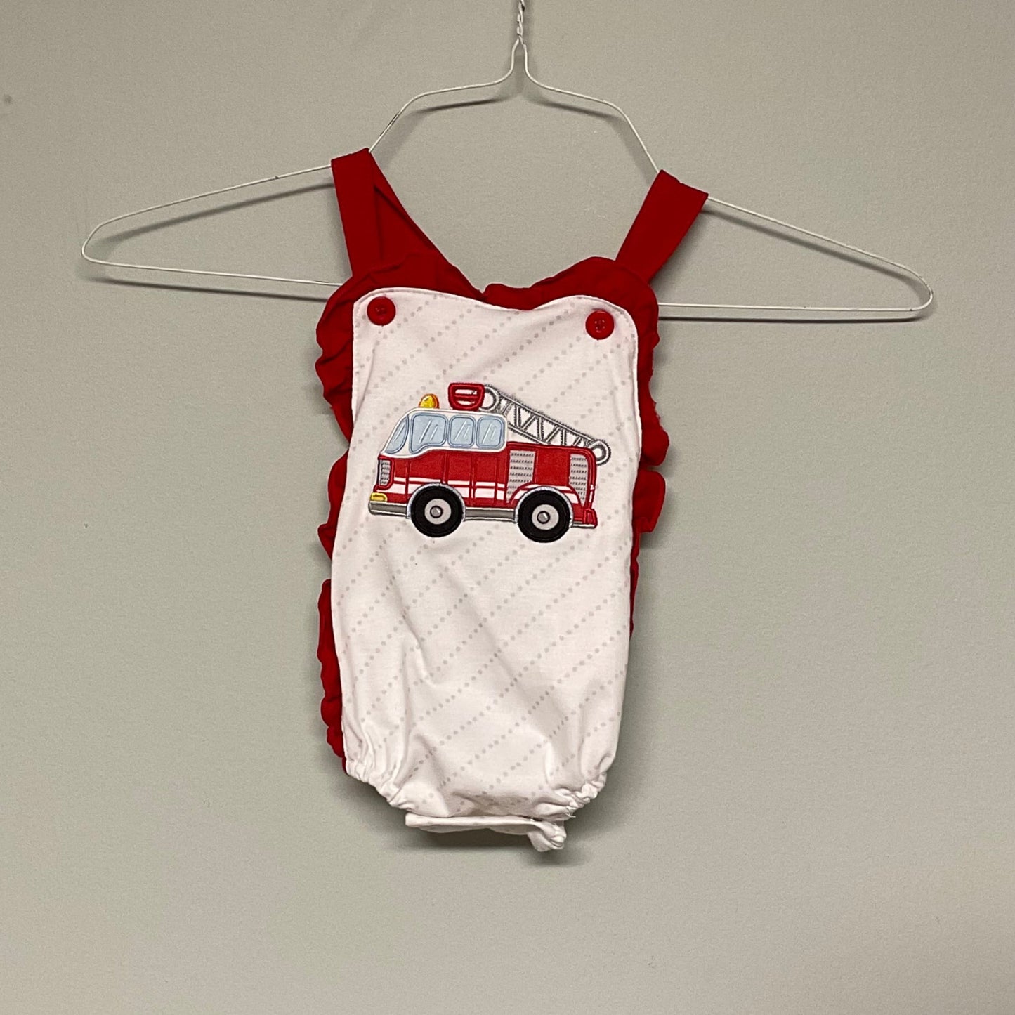 Abby + Evie firetruck sunsuit